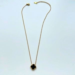 Black and gold clover necklace
